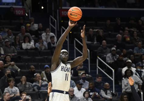 West Virginia forward Akok Akok hospitalized, stable after collapsing on court during exhibition